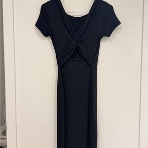 Black short sleeved Midi dress with front cut out and knot front detail.